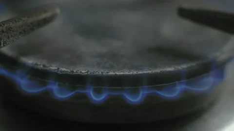 Macro, Gas Burner with The Burning Flame on the Kitchen Plate Stock Footage 156481680