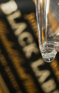 Macro Glass Whisky Drop Stock Photos