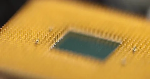 Macro golden microprocessor computer parts closeup 4k movie slow motion Video stock 166026172