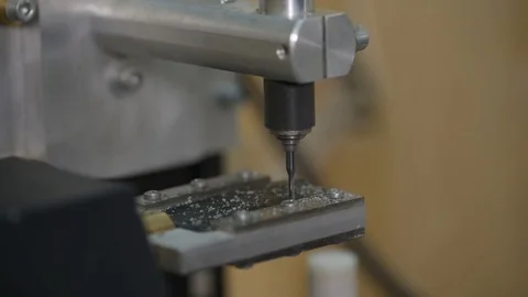 Macro of a goldsmith cutting and filing the steel to make a ring. Concept Stock Footage 120004688