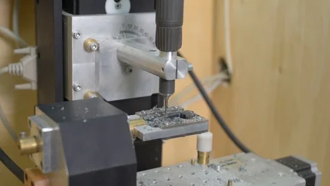 Macro of a goldsmith cutting and filing the steel to make a ring. Concept Stock Footage 120004868