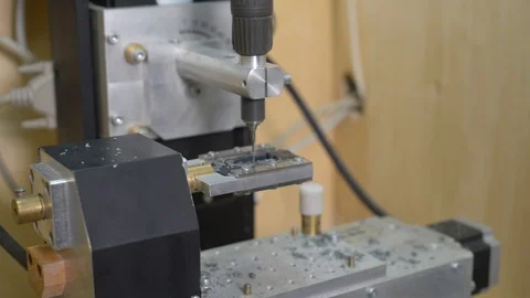 Macro of a goldsmith cutting and filing the steel to make a ring. Concept Stock Footage 120004955