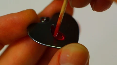 Macro of a goldsmith cutting and filing the steel to make a ring. Concept Stock Footage 120006543