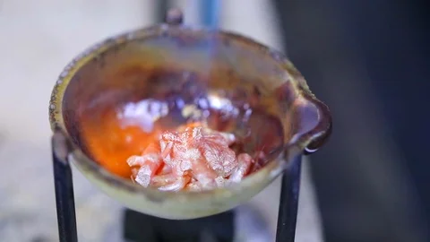 Macro of a goldsmith cutting and filing the steel to make a ring. Concept Stock Footage 120007364
