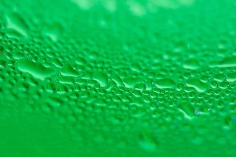 Macro of Green Water Bubbles on cold water bottle Stock Photos