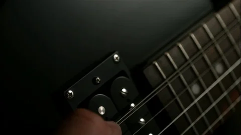 Macro Guitar String Vibrates in Slow Motion Video stock 70370178