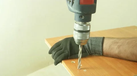 Macro hands with drill Stock Footage 59132269