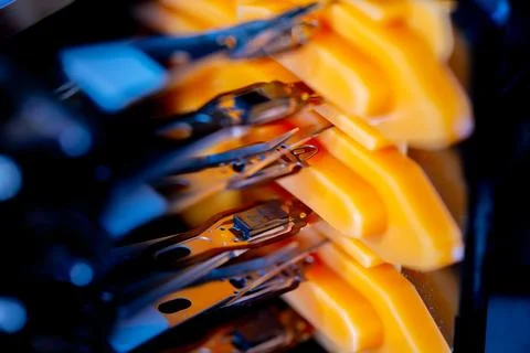 Macro hard disk drive HDD head. Stock Photos