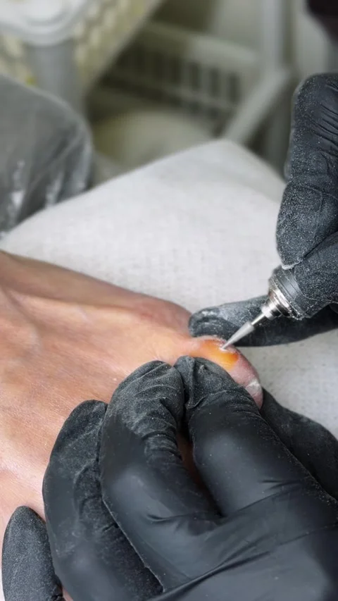 Macro hardware pedicure electric drill cuticle care Stock Footage 332986564