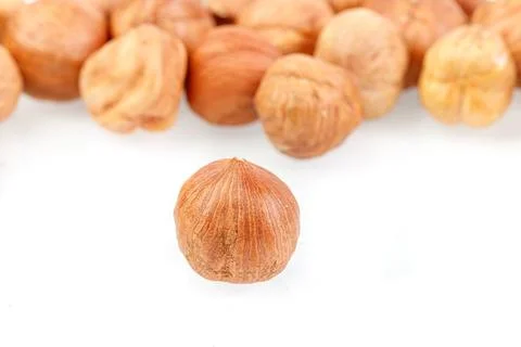 Macro hazelnuts nuts on a white background Stock Photos