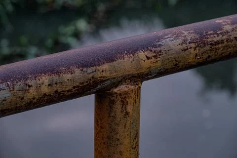 Macro of heavy industrial rust texture at twilight on iron pipe Stock Photos