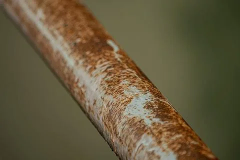 Macro of heavy raw metal rust at night on iron conduit Photos