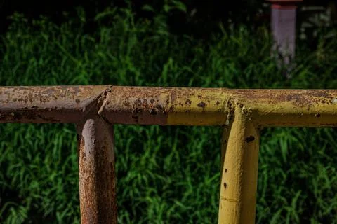 Macro of heavy rust texture on iron pipe joint steel structure at night Stock Photos