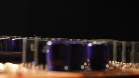 Macro of High-Power Transistors and Capacitors in 3-Row Array on a PCB Stock Footage 331170859