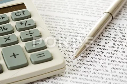 Macro image of calculator and pen on business document Stock Photos