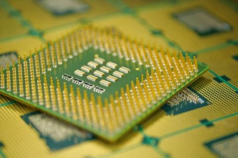 Macro image of CPU pins emphasizing organized structure for stable operation Stock Photos