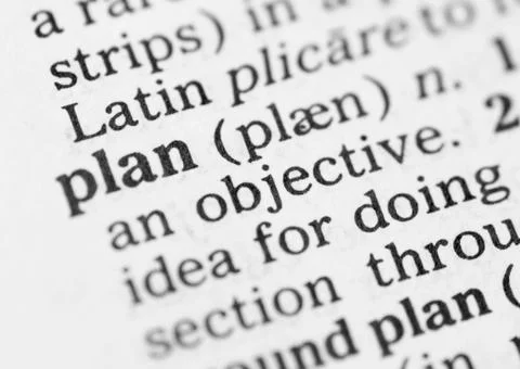 Macro image of dictionary definition of plan Stock-Fotos