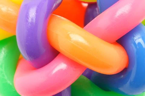 Macro image of interlocked multicolor rubber rings Stock Photos