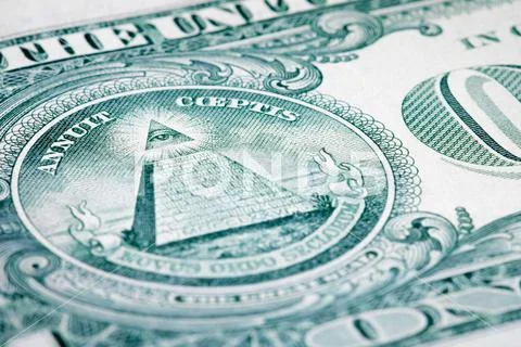 Macro image of one dollar bill with a truncated pyramid and an all ...