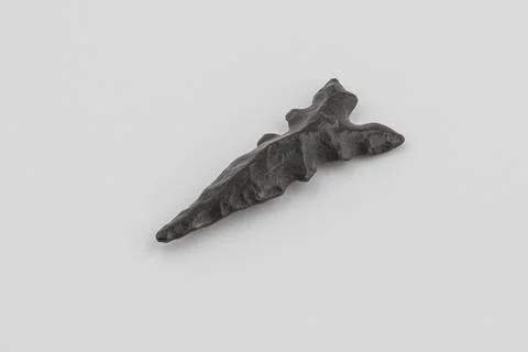 Macro image of an original arrowhead from the Paleolithic Age Stock Photos