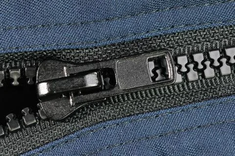 Macro image of plastic black zipper. Stock Photos