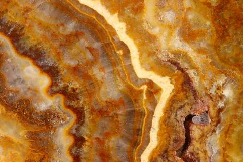 The macro image of the polished natural marble stone Onyx. Stock Photos