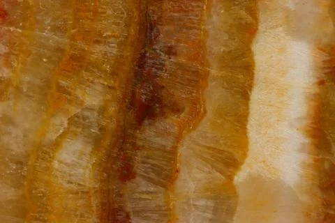 The macro image of the polished natural marble stone Onyx. Stock Photos