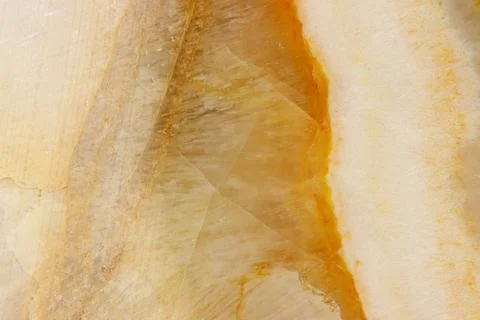 The macro image of the polished natural marble stone Onyx. Stock Photos
