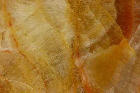 The macro image of the polished natural marble stone Onyx. Stock Photos