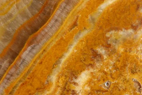 The macro image of the polished natural marble stone Onyx. Stock Photos