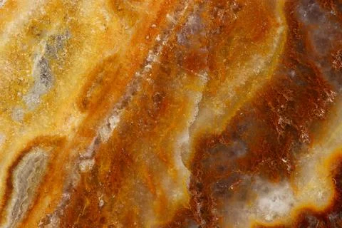 The macro image of the polished natural marble stone Onyx. Stock Photos