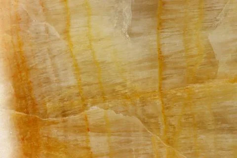 The macro image of the polished natural marble stone Onyx. Stock Photos