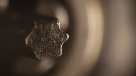 Macro image of a rotating Torx bit on a power screwdriver. Stock Footage 303172596