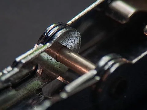 A macro image shows complex mechanism with metallic elements, highlighting .. Stock Photos