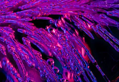 Macro images of streaming bubbles in ice with side lighting Stock Photos