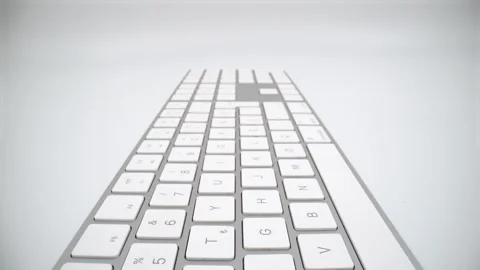 Macro of keys of wireless keyboard on white background isolated Stock Footage 328963790