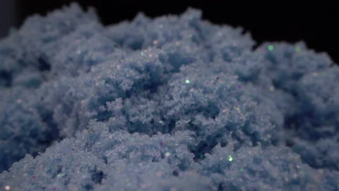 Macro Kinetic Sand Falling Blue Sensory Stock Footage 137562975