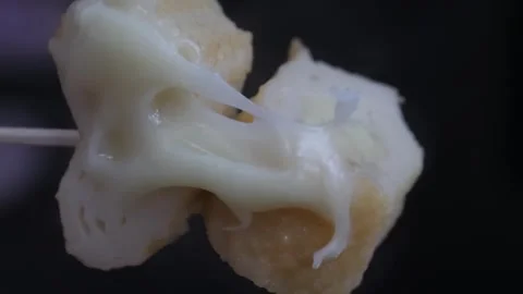 Macro of Korean Fish Cake (Eomuk) with Melted Gooey Cheese on a Skewer Stock Footage 337374299