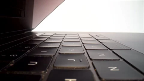 Macro of laptop keyboard keys on white background isolated Stock Footage 328963977