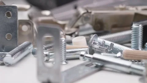 Macro lens captures screws, hinges, and dowels in close detail, with the ca.. Stock Footage 293052991