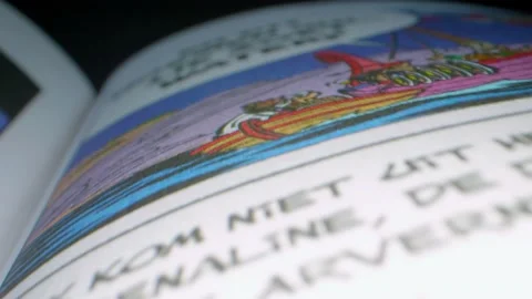 Macro Lens Tracks Through The Pages Of A Comic Book Stockbeeldmateriaal 141732789