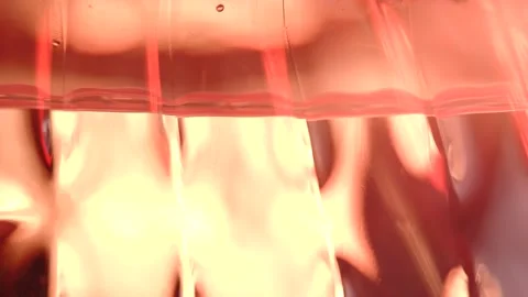 Macro level view of water in bottle bright light Stock Footage 234514521