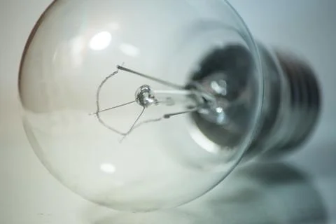 Macro Light Bulb on White Background Stock Photos