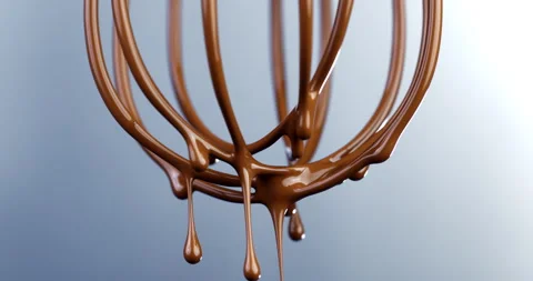 Macro of liquid dark cocoa chocolate cream falls from metal mixing whisk Stock Footage 268422559