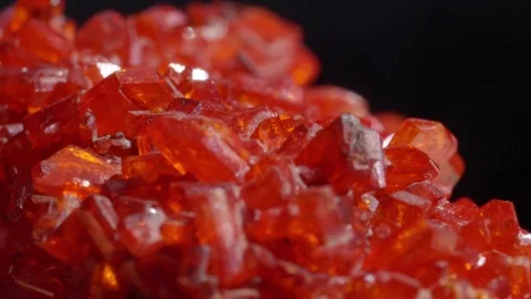 MACRO Luminous bright red Ruby mineral with fiery undertones shining under light Stock Footage 84592298