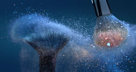 Macro of makeup brushes with flying cosmetic product powder particles splash Stock Footage 268980016