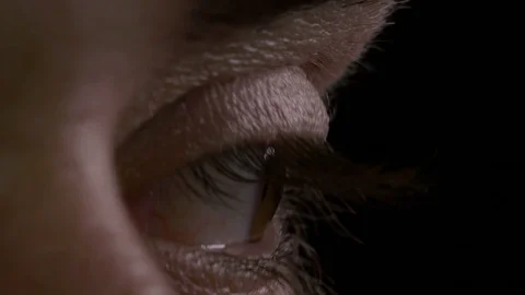 Macro of man eye looking around left and right up and down Stock Footage 75537330
