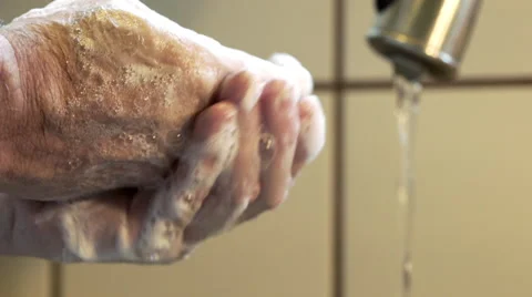 Macro of a man washing his hands 4k Stock Footage