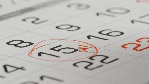 MACRO: Marking a pay day in a calendar by red pen Stock Photos