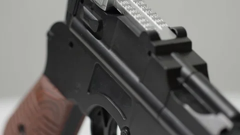 Macro mauser gun handle spinning on white Vidéo 89818219